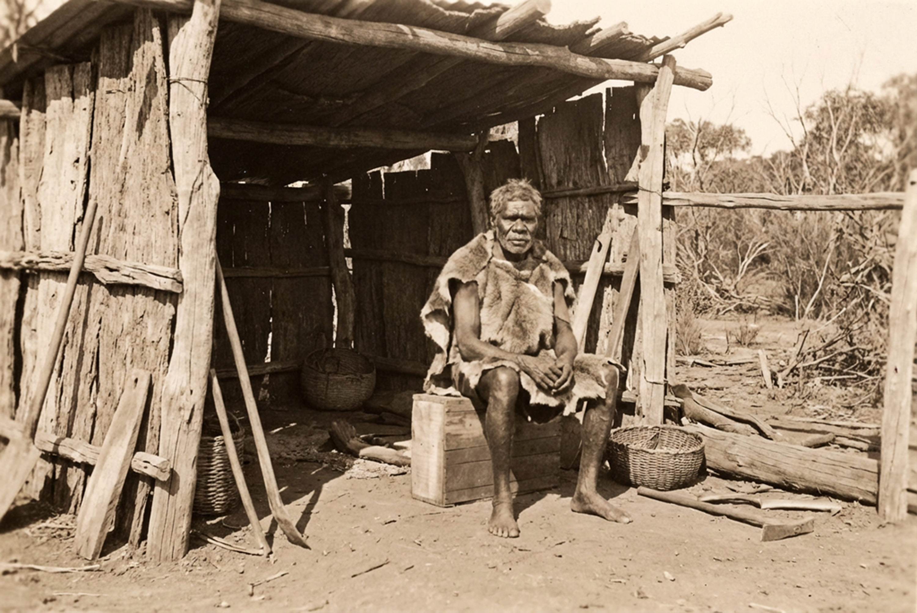 A Man Waits - Symbolic image of community resilience